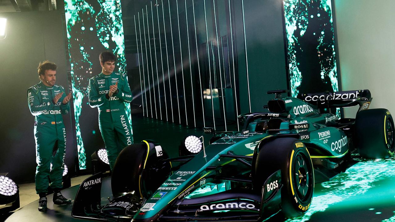 Fernando Alonso and Lance Stroll at F1’s season launch. (Photo by ASTON MARTIN / AFP)