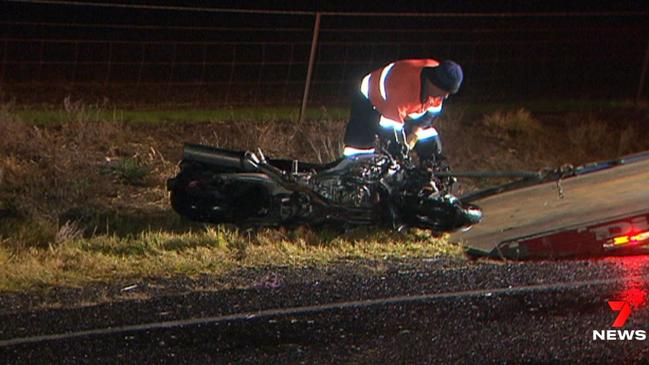 The motorbike lying on the side of the road after the crash. Picture: 7NEWS