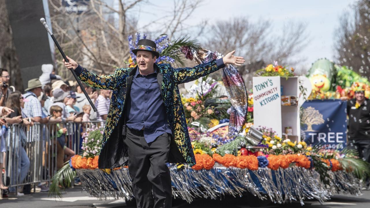 Anthony Hurle leads the Tony's Community Kitchen float in the Grand Central Floral Parade. Saturday, September 17, 2022. Picture: Nev Madsen.