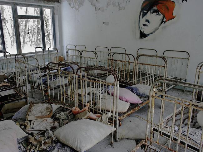 The remnants of beds are seen in an abandoned in a preschool in the deserted town of Pripyat. Picture: Daniel Berehulak/Getty Images