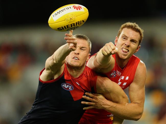 Rory Thompson (right) has been ruled out for the season with a knee injury. Picture: Jono Searle/AFL Media.