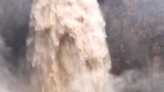 A raging Purling Brook falls. Photo: Reuben Nutt