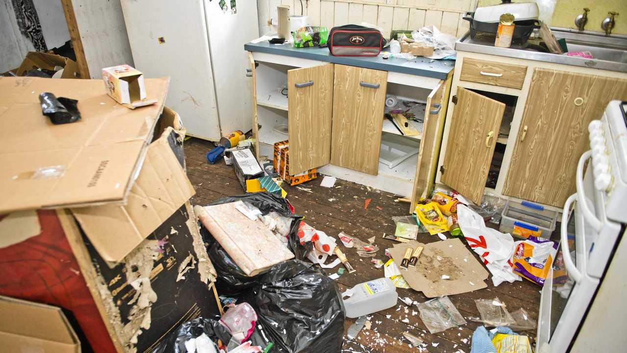 SQUALOR: Inside the kitchen of the North Toowoomba home owned by Joe Courte. Mr Courte said the fridge, despite being turned on, was full of rotting food riddled with maggots and cockroaches. Picture: Nev Madsen