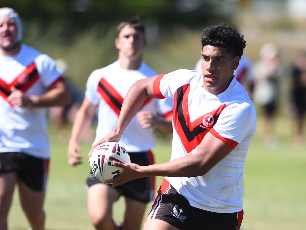 Boys Rugby League State Championship held at Northern Division, Brothers Leagues ground, Townsville. South West (black) v Wide Bay (white). 16-18 years. Noah Law of Shalom College.