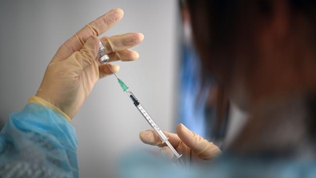 A medical assistant prepares a syringe with the Pfizer-BioNTech Covid-19 vaccine in Germany. Picture: Ina Fassbender/AFP