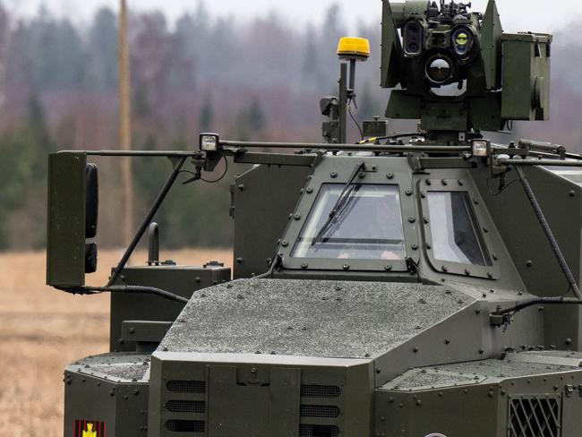 Prince William is seen at the front of a Swedish Archer 155mm Wheeled Self-Propelled Howitzer artillery system. Picture: AFP