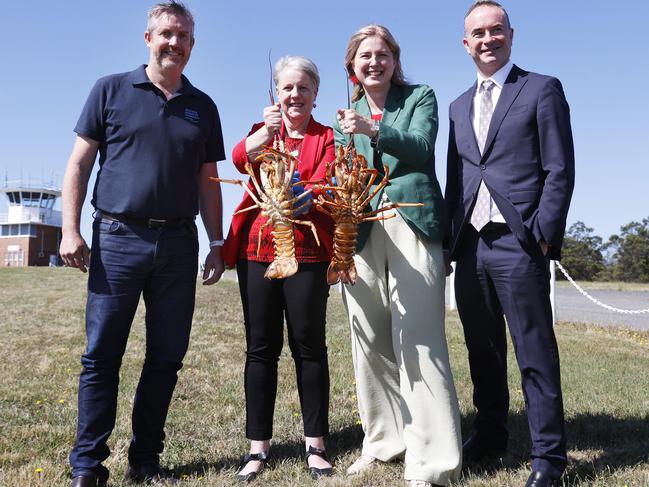 Julian Harrington CEO Seafood Industry Tasmania, Senator Catryna Bilyk, Minister Julie Collins, Norris Carter CEO Hobart Airport.   Hobart Airport runway works progress.  Picture: Nikki Davis-Jones