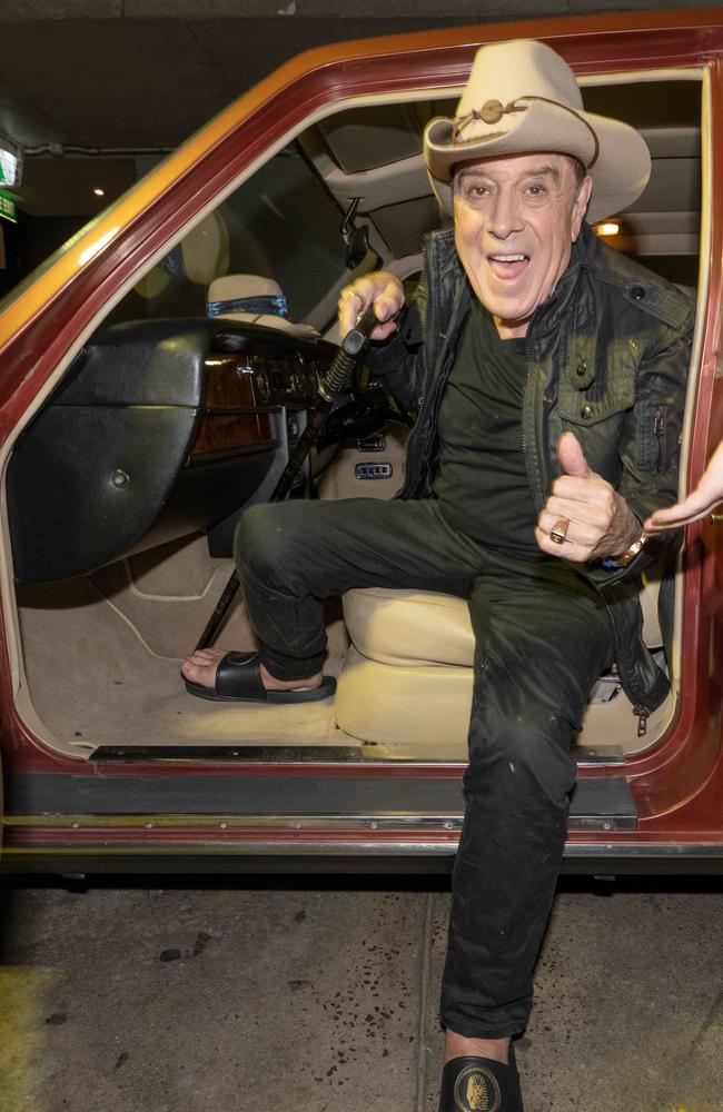 Molly Meldrum pictured on arrival at his 80th birthday party. Picture: Tony Gough