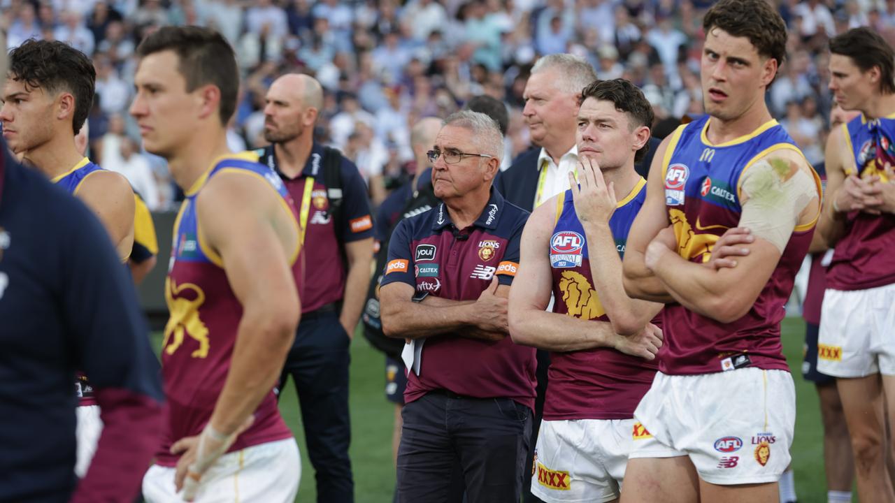 MELBOURNE , AUSTRALIA. September 30, 2023.   AFL Grand Final between Collingwood and the Brisbane Lions at the MCG. Losing team Brisbane Lions players with coach Chris Fagan.Picture by David Caird