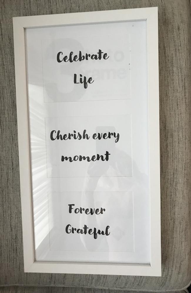 Framed words that hang in the Dionysius' house: Celebrate life. Cherish every moment. Forever grateful. Picture: Susan Dionysius