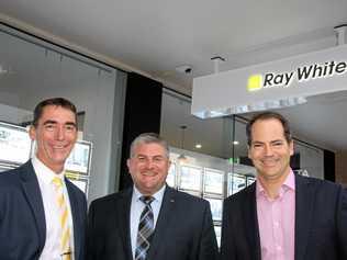 Brett Graham, Tony Warland and Dan Smith celebrate the new Ray White office opening in Burnett St, Buderim. Picture: Erle Levey