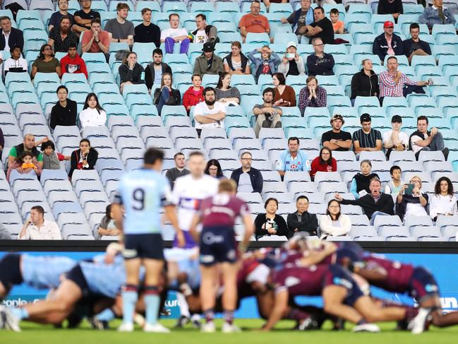 SYDNEY, AUSTRALIA - MARCH 27: The crowd watches on during the round 6 Super RugbyAU match between the NSW Waratahs and the Queensland Reds at Stadium Australia, on March 27, 2021, in Sydney, Australia. (Photo by Mark Kolbe/Getty Images)