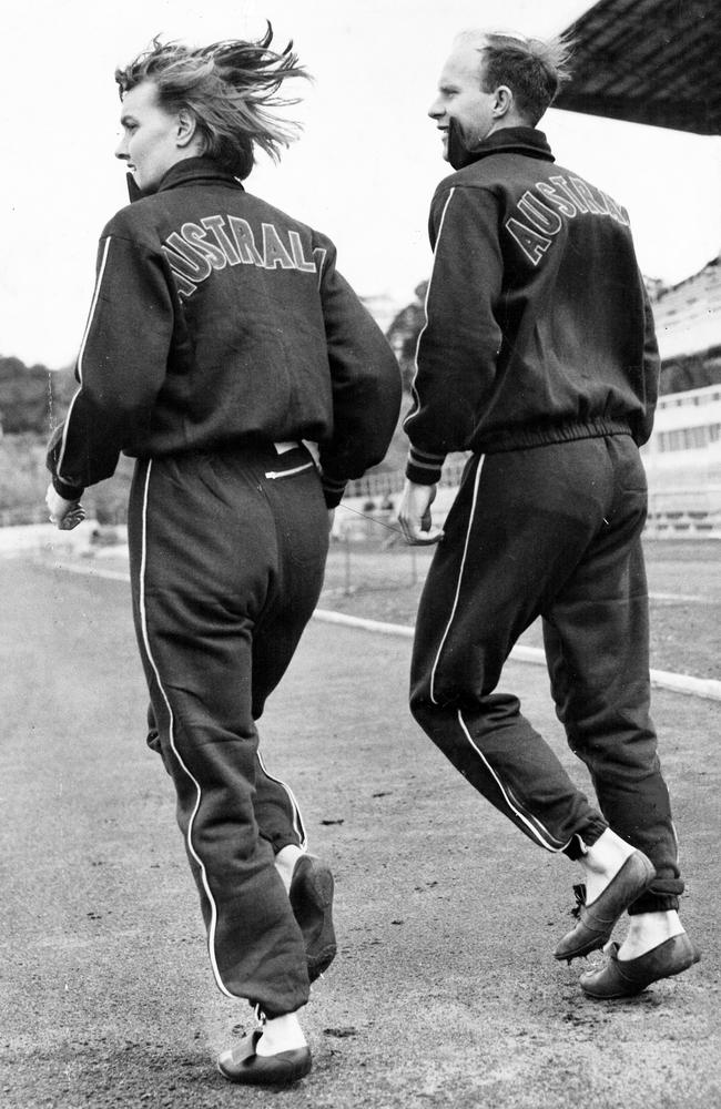 Sprinters Hec Hogan and Winsome Cripps showcase the uniform Australian athletes will wear at the 1956 Melbourne Olympic Games. Picture: News Corp Australia