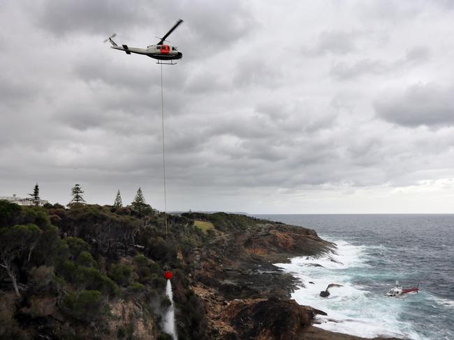 Cool, wet weather is assisting firefighting efforts. Picture: Gary Ramage