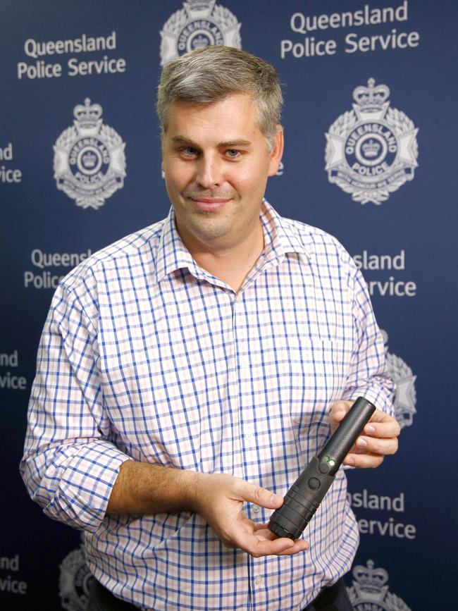 Police Minister Mark Ryan with the new wands that will be trialled on the Gold Coast. Picture: Tertius Pickard