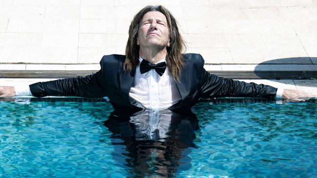 Cosmetic surgeon and hotel owner Jerry Schwartz in the pool at his $67.25m mansion in Sydney’s Vaucluse. Picture: Nic Walker