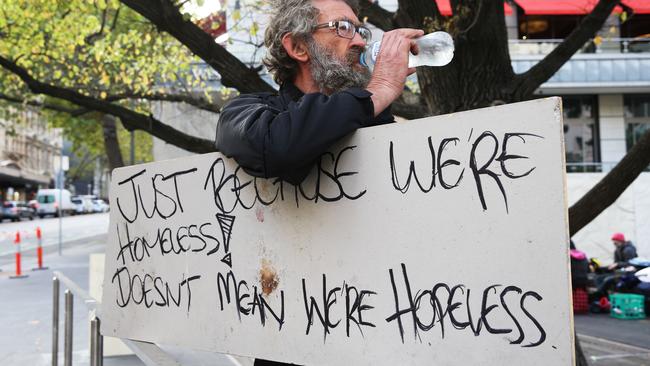 A homeless man in Melbourne protests police ‘moving them on’ from the city centre. Picture: Mark Wilson