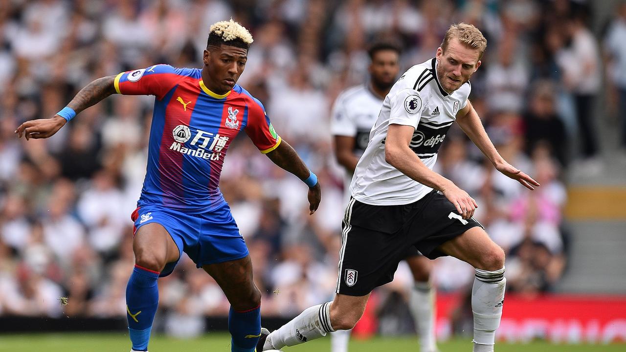 Crystal Palace's Dutch defender Patrick van Aanholt (L) is a vocal leader in the fight against racism.