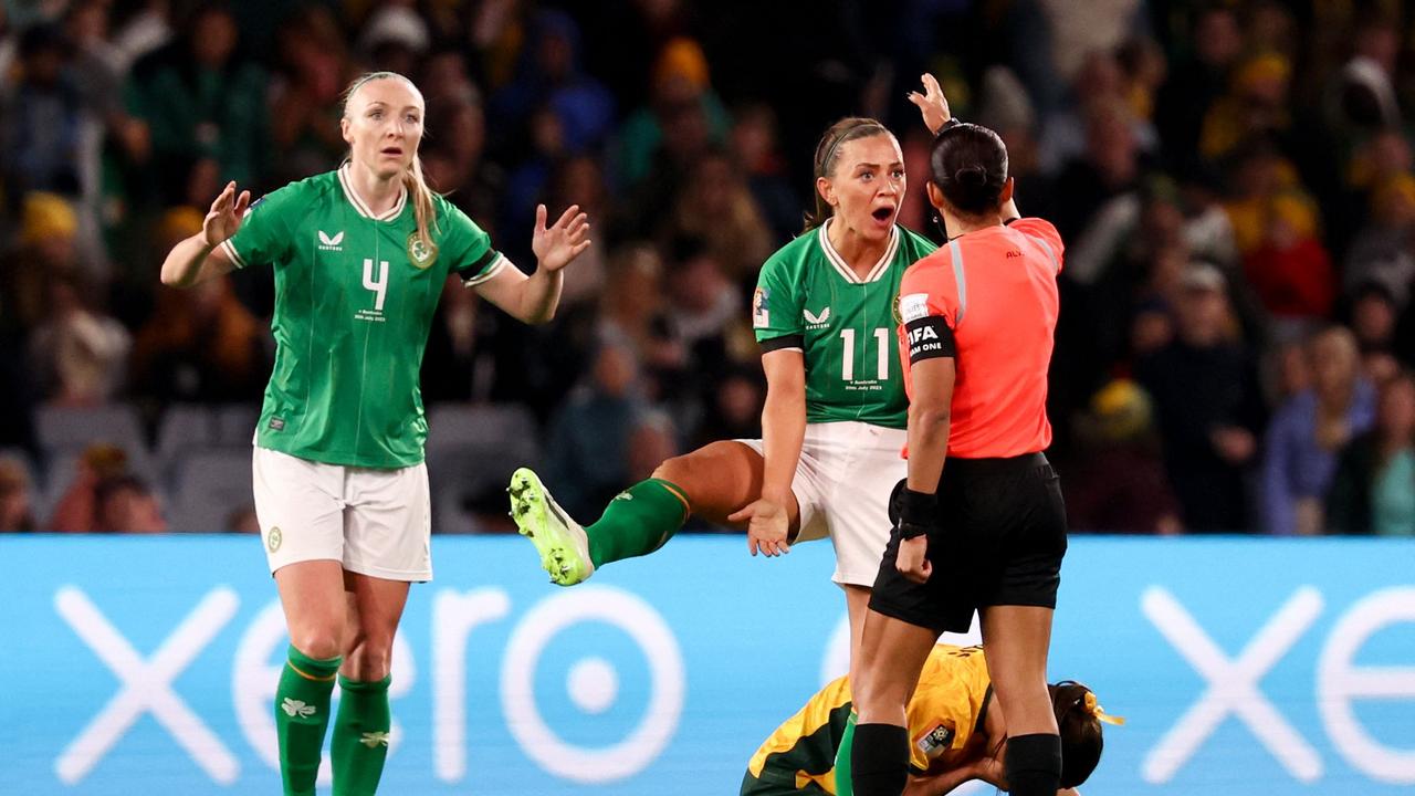 Ireland's midfielder Katie McCabe (2nd R) appeals to the referee after Australia's Hayley Raso (bottom) was brought down. Picture: AFP