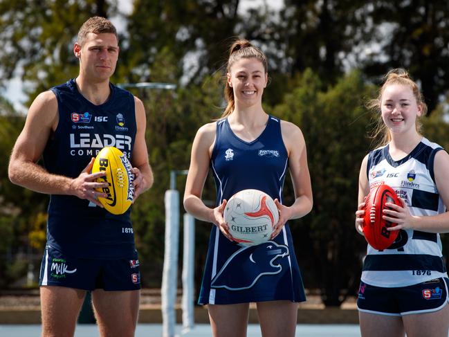 Netballer Eilish McKay between footballers Alex Cailotto and Jaslynne Smith on September 14, 2020 in Mile End. Premier League netball club Woods Panthers will become South Adelaide Netball Club they join forces with the South Adelaide SANFL club.