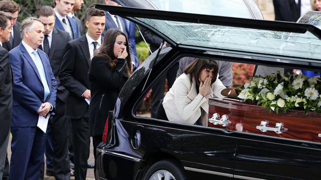 Stuart's mother Kathy Kelly says goodbye at Stuart’s funeral last year. Picture: Craig Greenhill