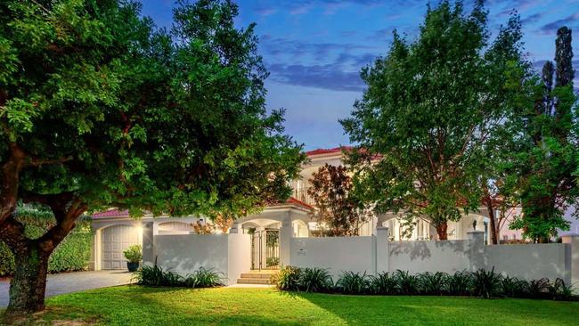 The five-bedroom, five-bathroom late 1990s-built house in Brisbane, on a sprawling 1453sq m holding, fetched $6.9m at auction.