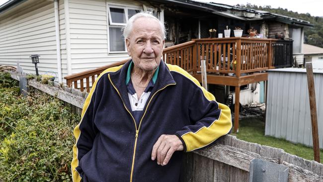 Ted Sherrin stands in his backyard of his Oakbank Ave home in Montrose as his neighbours house caught fire last night. Picture: Zak Simmonds