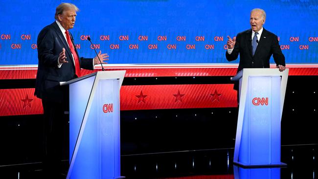 Donald Trump and Joe Biden face in Atlanta on Thursday night. Picture: AFP