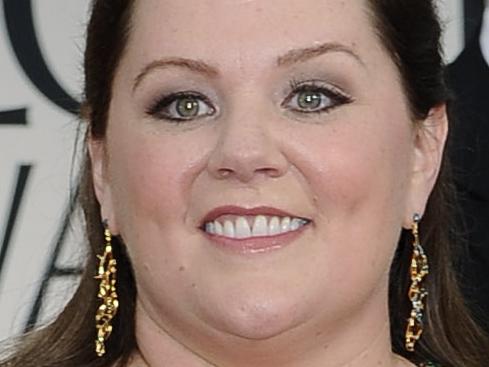 Melissa McCarthy arrives at the 69th Annual Golden Globe Awards in Los Angeles, California 15/01/2012.