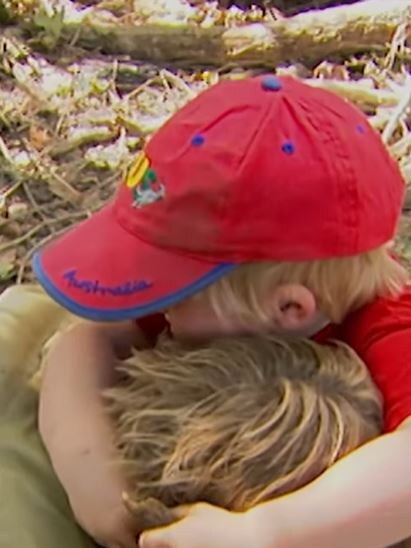 The father and son hugging in an archive video. Picture: Supplied