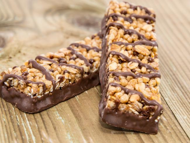 Chocolate Muesli Bars on wooden background