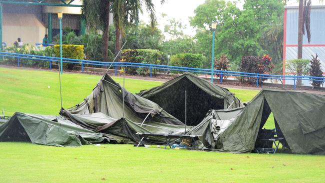 Territory residents from Borroloola and Robinson River had a bit of a fright this morning when the tents where damaged in the winds, as the communities find reprieve from Cyclone Trevor at the Marrara sports complex in Darwin. Picture: Justin Kennedy