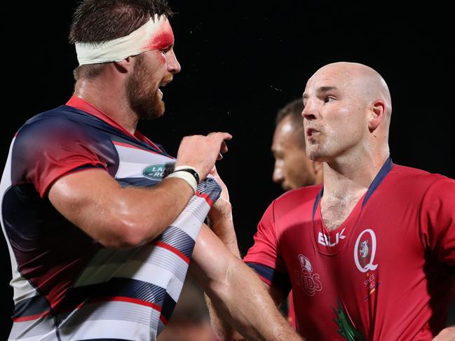 Stephen Moore of the Reds takes on Steve Cummins of the Rebels during the Rugby Union trial game between the Queensland Reds and the Melbourne Rebels. Pic Darren England.