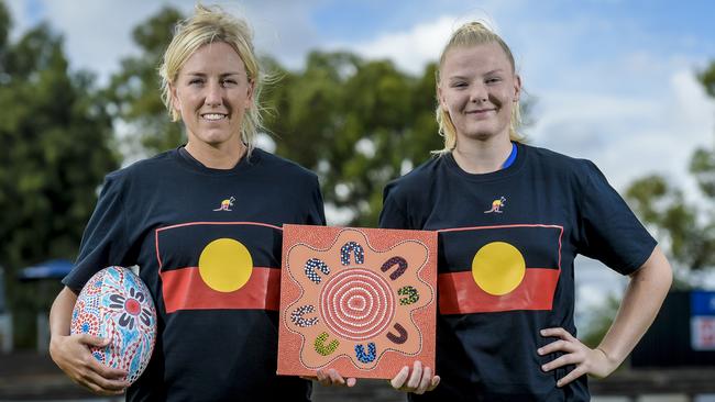 West Adelaide’s Nicole Hooper and Central District’s Jessie Sandford with cultural exchange gifts ahead of Saturday’s live streamed SANFLW Indigenous Round clash. Picture: Roy VanDerVegt