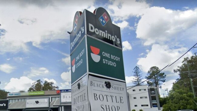 A 46-year-old The Gap man has been charged with two offences after allegedly assaulting an 18-year-old at Domino's on Waterworks Rd last week. Picture: Google Maps