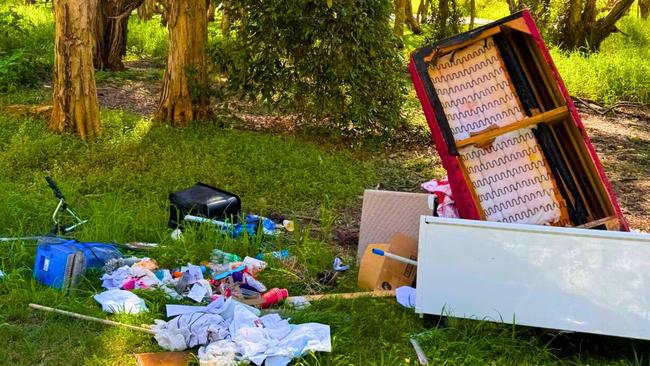 A fridge, a couch, plastic containers and bicycles were dumped at this site at Logan site at Eagleby this week. Debate has centred around the cost of taking goods to the tip. Picture: Facebook