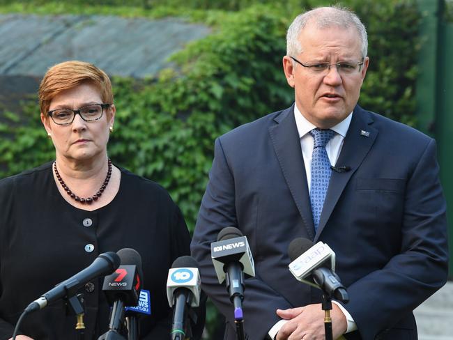 Prime Minister Scott Morrison with Foreign Minister Marise Payne addressing media at Kirribilli House. Picture: Getty Images