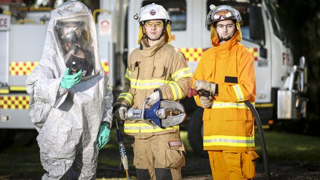 Athelstone CFS volunteers Julian Cali, Matt Di Virgilio and Jake Inkster. Picture: AAP / Mike Burton