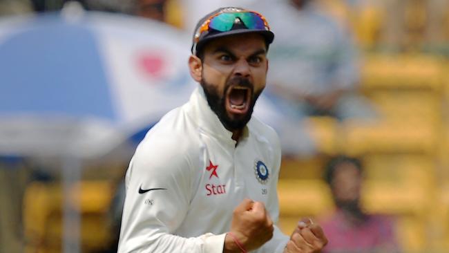 Indian captain Virat Kohli celebrates the dismissal of Australia’s Matthew Wade.