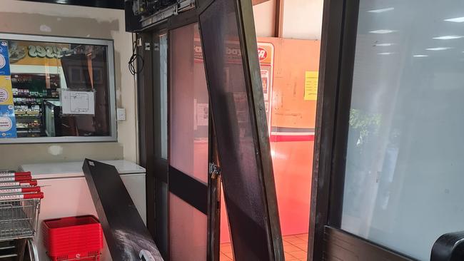 The damaged doors at the Fannie Bay IGA after the break in. Picture: Facebook