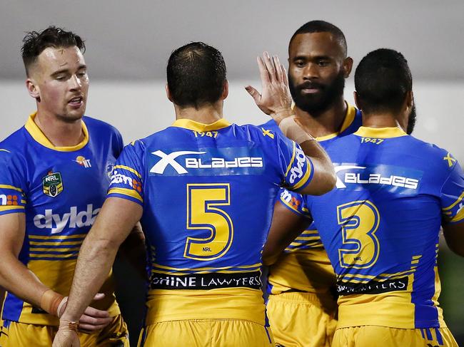 AUCKLAND, NEW ZEALAND - SEPTEMBER 04: Michael Gordon of the Eels celebrates with teammate Semi Radradra after a try during the round 26 NRL match between the New Zealand Warriors and the Parramatta Eels at Mt Smart Stadium on September 4, 2016 in Auckland, New Zealand. (Photo by Anthony Au-Yeung/Getty Images)