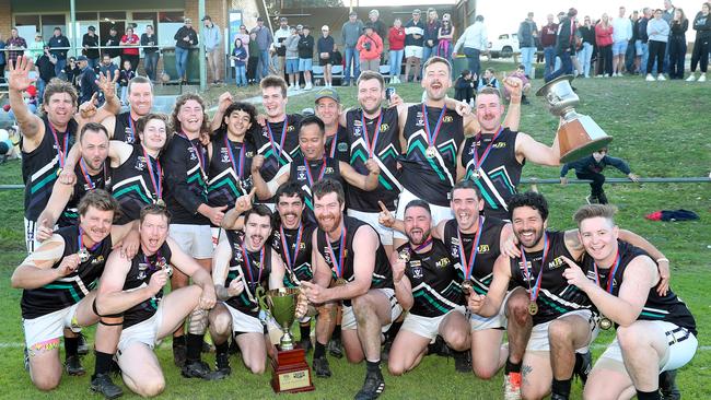 Omeo-Benambra players with the premiership cup.
