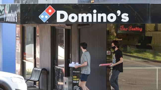 Customers leave the Domino's Pizza store in Portrush Rd, Glenunga. Picture: NCA NewsWire / Brenton Edwards