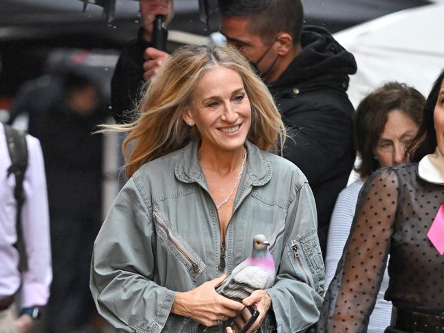 Sarah Jessica Parker on the set of "And Just Like That..." season 2 with her novelty pigeon clutch. Picture: James Devaney/GC Images.