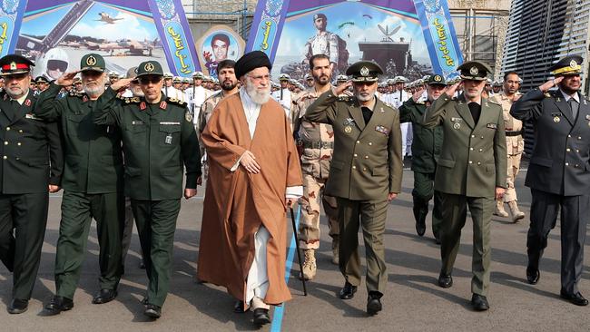 Ayatollah Ali Khamenei (C) alongside with Iranian military generals during the graduation ceremony of Army cadets in Tehran. Picture: EPA