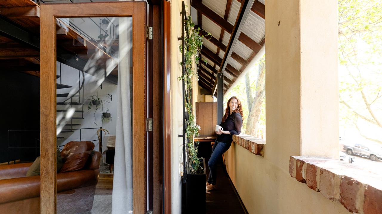 Host Sarah Abbot on the lofts balcony.