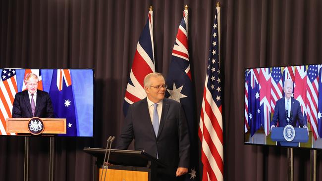 Boris Johnson, Scott Morrison and Joe Biden announce the creation of AUKUS via video conference on Thursday. Picture: Newswire/Gary Ramage