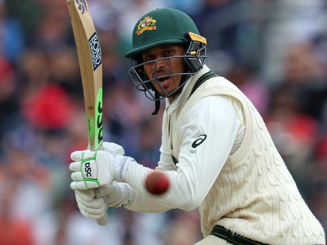 Australia's Usman Khawaja plays a shot on day four of the fifth Ashes cricket Test match between England and Australia at The Oval cricket ground in London on July 30, 2023. (Photo by Adrian DENNIS / AFP) / RESTRICTED TO EDITORIAL USE. NO ASSOCIATION WITH DIRECT COMPETITOR OF SPONSOR, PARTNER, OR SUPPLIER OF THE ECB