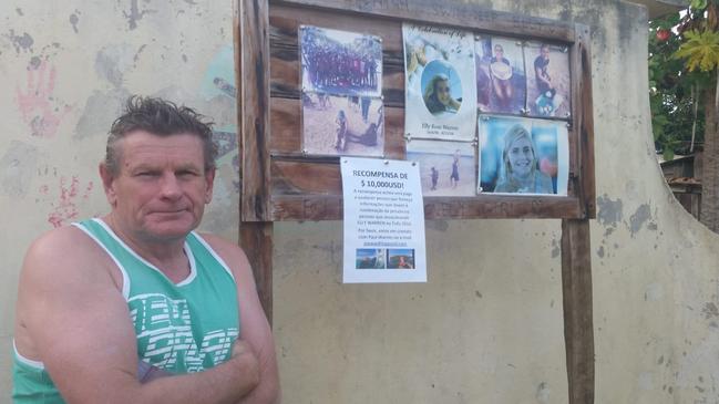 Paul Warren in Tofo, Mozambique. He is standing next to the place where his daughter was found dead.