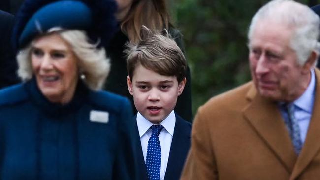 Prince George follows Queen Consort Camila and King Charles as they walk to the Sandringham Christmas Day church service. Picture: AFP